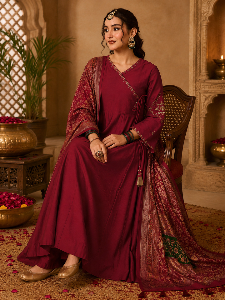 women-viscose-silk-embroidered-flared-kurta-set-maroon-seated-view-bohorang