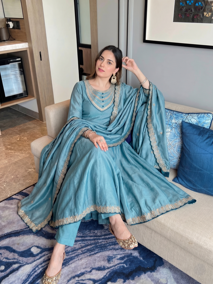 women-sea-blue-vichitra-silk-anarkali-kurta-set-seated-view-bohorang
